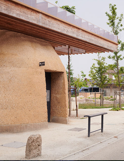 Structure bois et terre crue sur un projet de construction neuve écologique